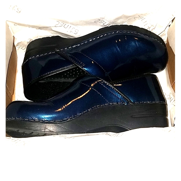 sanita blue clogs